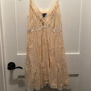 Pastel yellow dress with lace trim